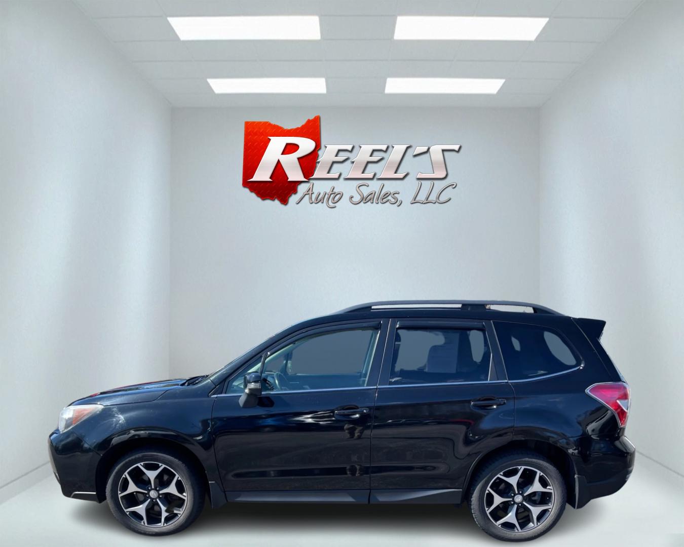 2014 Black /Black Subaru Forester 2.0XT Touring (JF2SJGMC4EH) with an 2.0L H4 SOHC 16V TURBO engine, Automatic transmission, located at 547 E. Main St., Orwell, OH, 44076, (440) 437-5893, 41.535435, -80.847855 - Photo#9